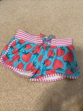 Coolibar Girls Blue Swim Trunks with Pink Strawberry Print- new without tags